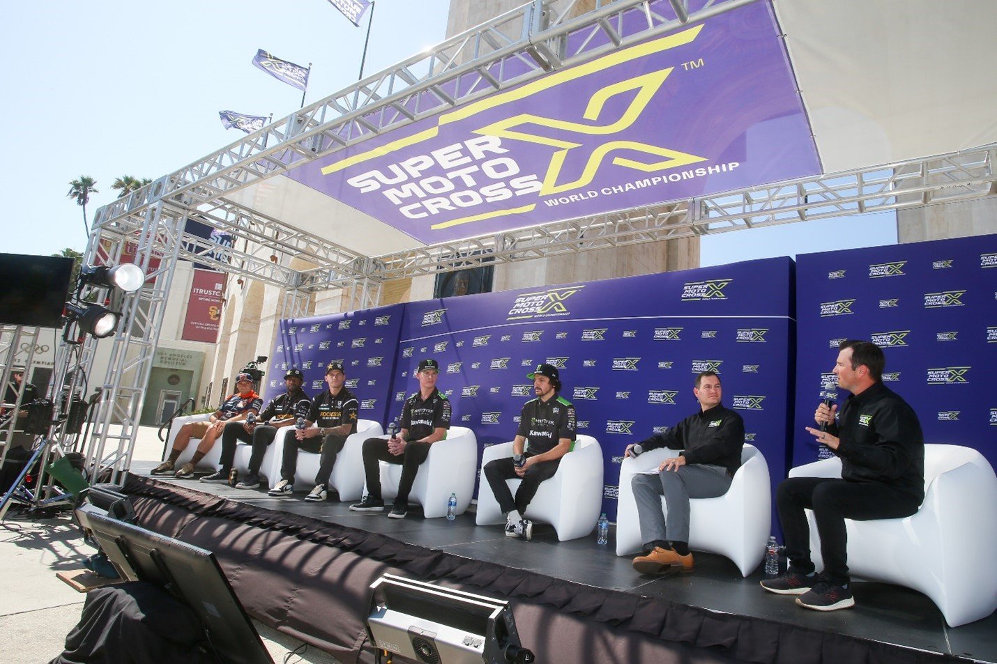 Elite Racers Cooper Webb, Malcolm Stewart, Christian Craig, Adam Cianciarulo, and Jason Anderson speaking with hosts Jason Weigandt and Daniel Blair at the SuperMotocross World Championship press event staged at the Los Angeles Memorial Coliseum in Los Angeles. (Photo Credit: Feld Motor Sports)