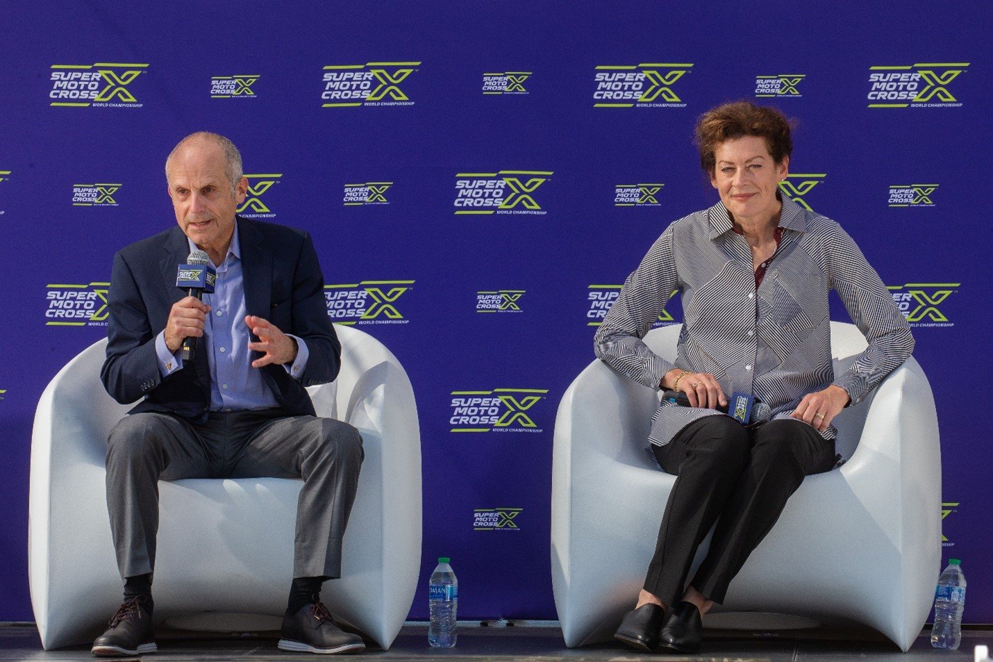 Kenneth Feld, Chair and CEO, Feld Entertainment, Inc., and Carrie Coombs-Russell, CEO MX Sports Pro Racing, speaking at the SuperMotocross World Championship press event at the Los Angeles Memorial Coliseum in Los Angeles. Photo Credit: Feld Motor Sports