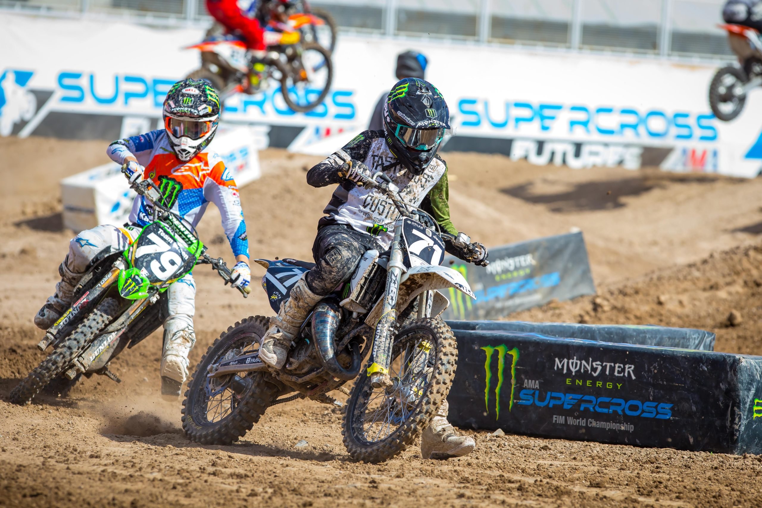 Atlas Speed Factory’s Talon Hawkins (71) leading Team Green Kawasaki’s Jett Reynolds (79) in Las Vegas at the final round of Supercross Futures. Photo Credit: Feld Entertainment, Inc.