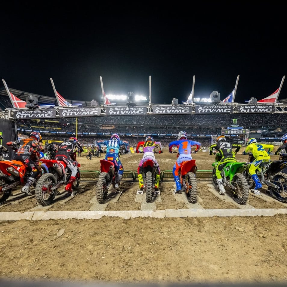 450SX Class racers prepare to launch off the starting gate at Anaheim 2