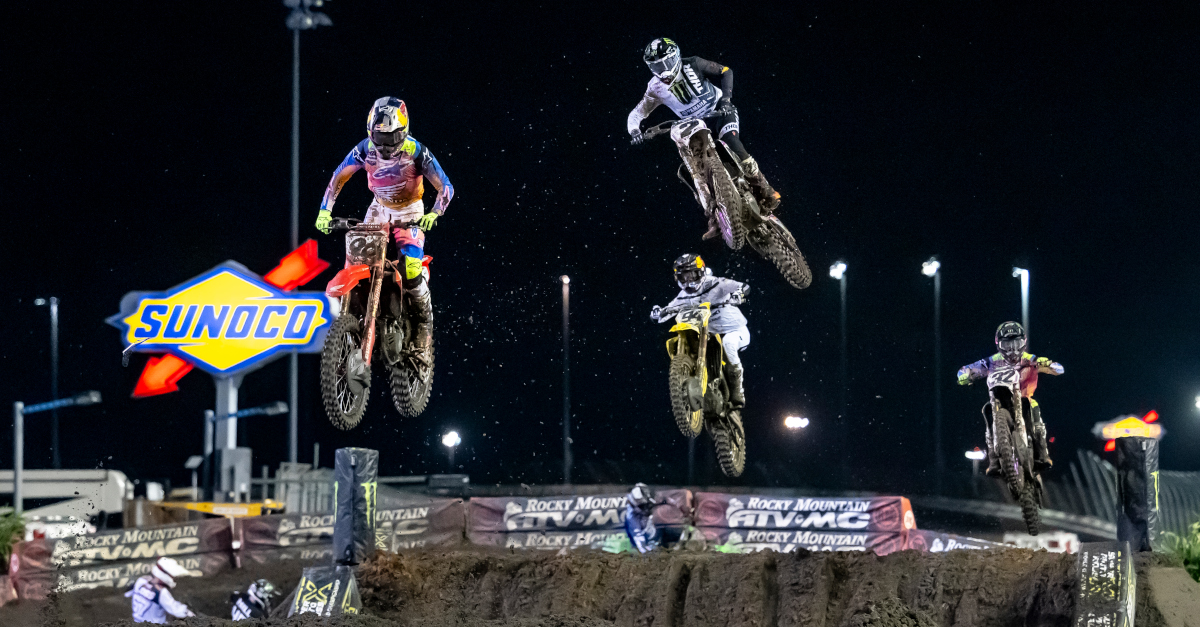 Photo of 4 Supercross bikes racing another at Daytona