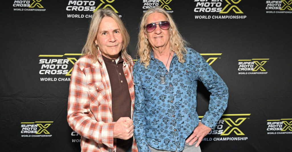 Metal Hall of Fame Class of 2024 Inductee Carlos Cavazo (left) and brother Tony walk the Red Carpet at Monster Energy Supercross’ celebrity event at Angel Stadium of Anaheim in Anaheim, California. Photo Credit: Feld Motor Sports